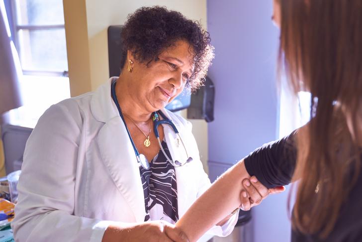 doctor examining a patient