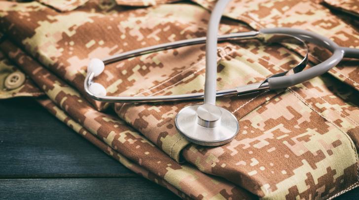 desert camo pattern pants with stethoscope