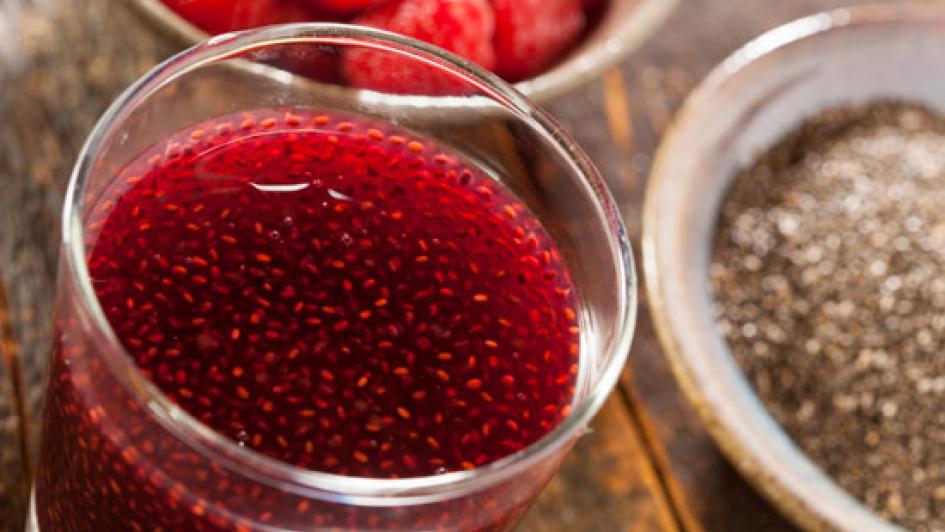 glass of chia seeds mixed with raspberry drink