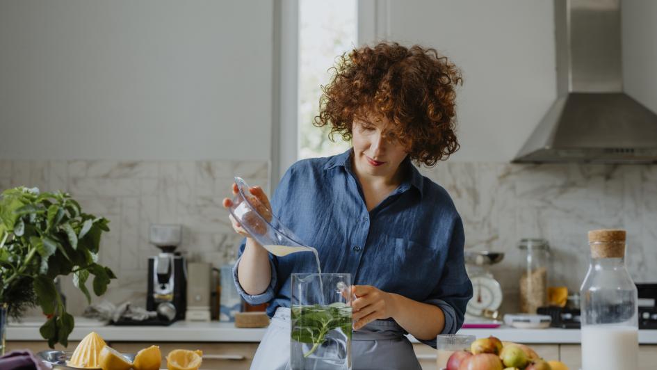 Woman Making Mint Lemonade