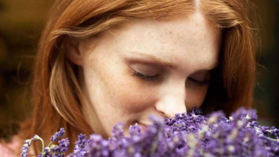 person smelling lavendar