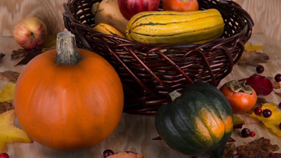 bowl of vegetables and a persimmon