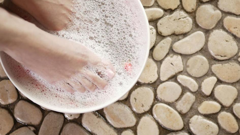 feet soaking in soapy water