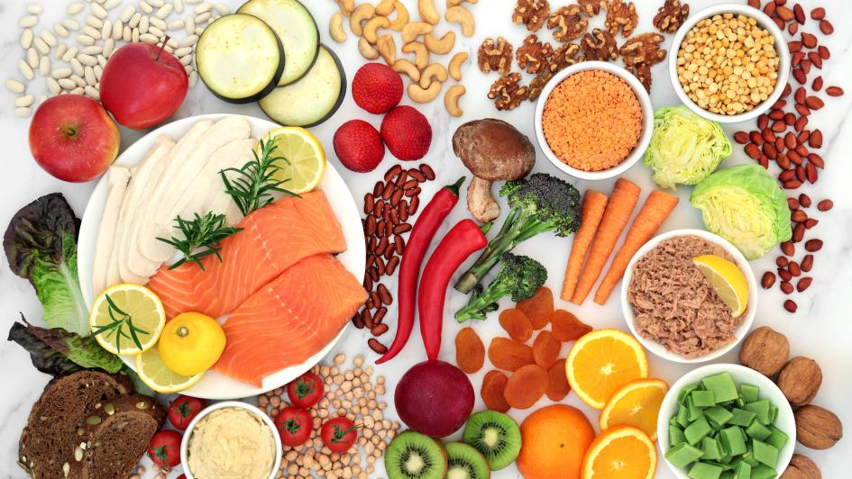 spread of different whole foods on a table