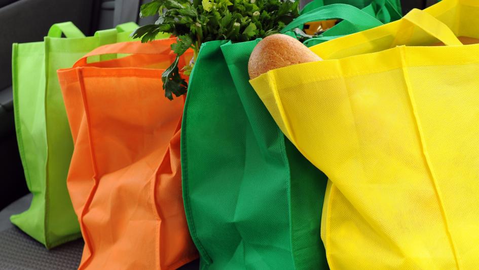 4 bags of produce and bread