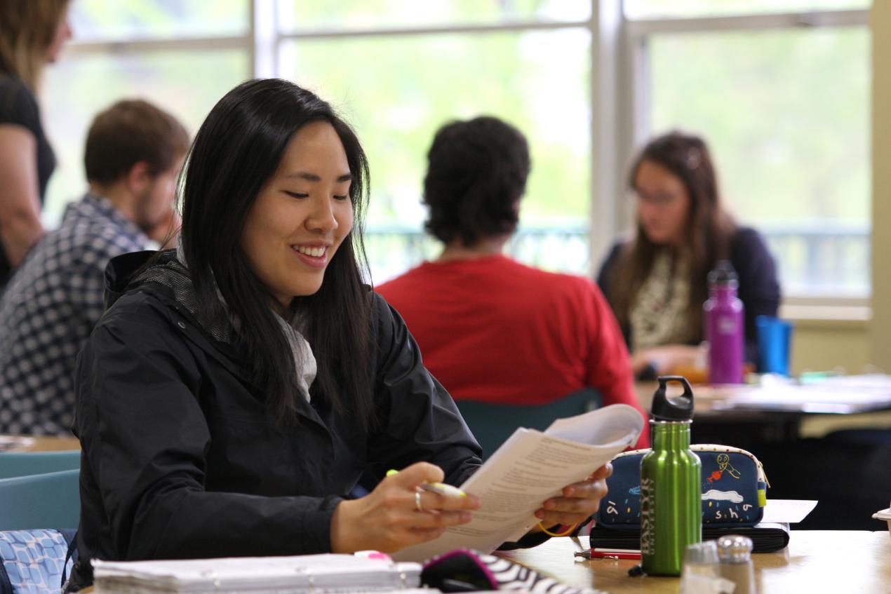 person studying at table