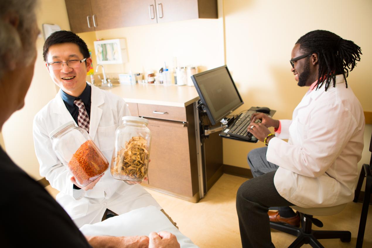 two providers sitting in clinic room